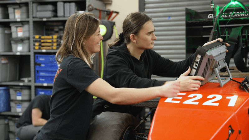Testing a race car with battery enabled oscilloscope