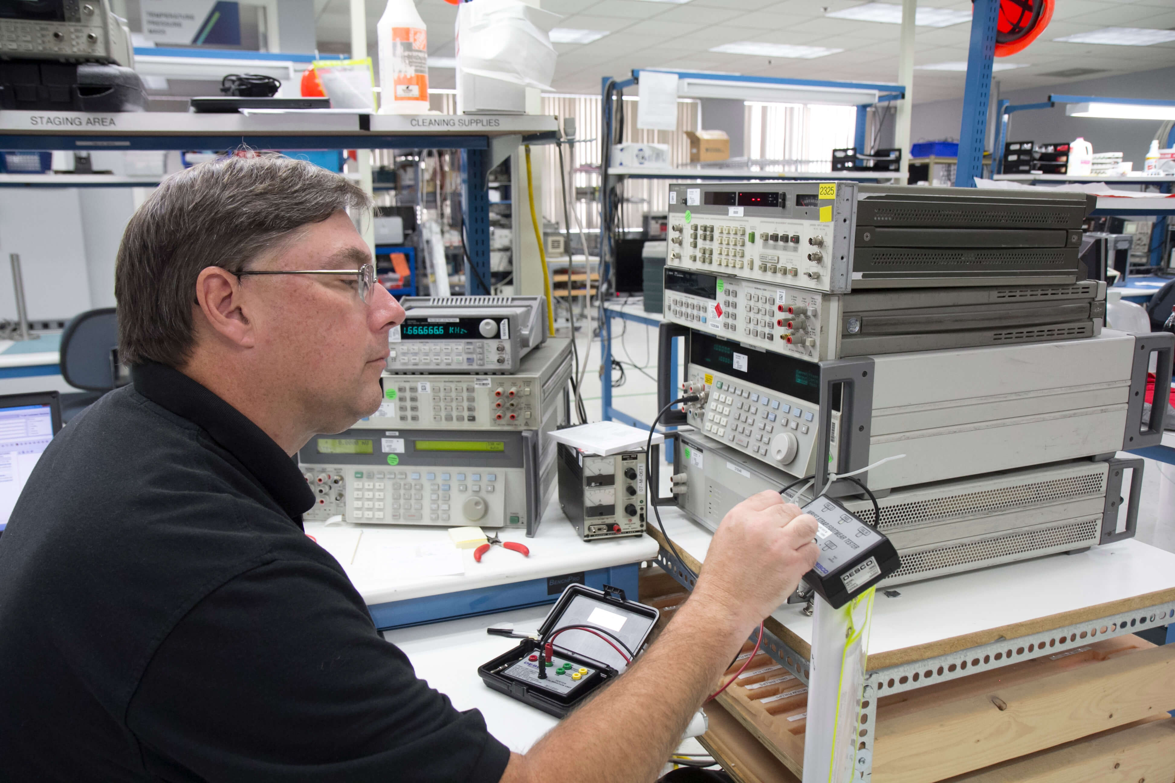 Tektronix calibration and service technician at work