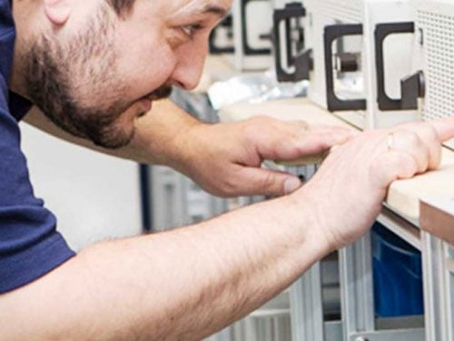 Test engineer choosing a Benchtop Power Supply