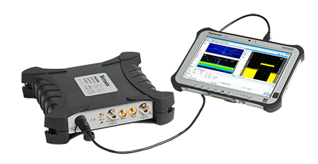 RSA500 Spectrum Analyzer plugged into a tablet PC running SignalVu-PC and displaying a DPX density trigger