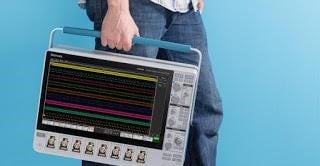 5 Series MSO being carried 5-series-mixed-signal-oscilloscope